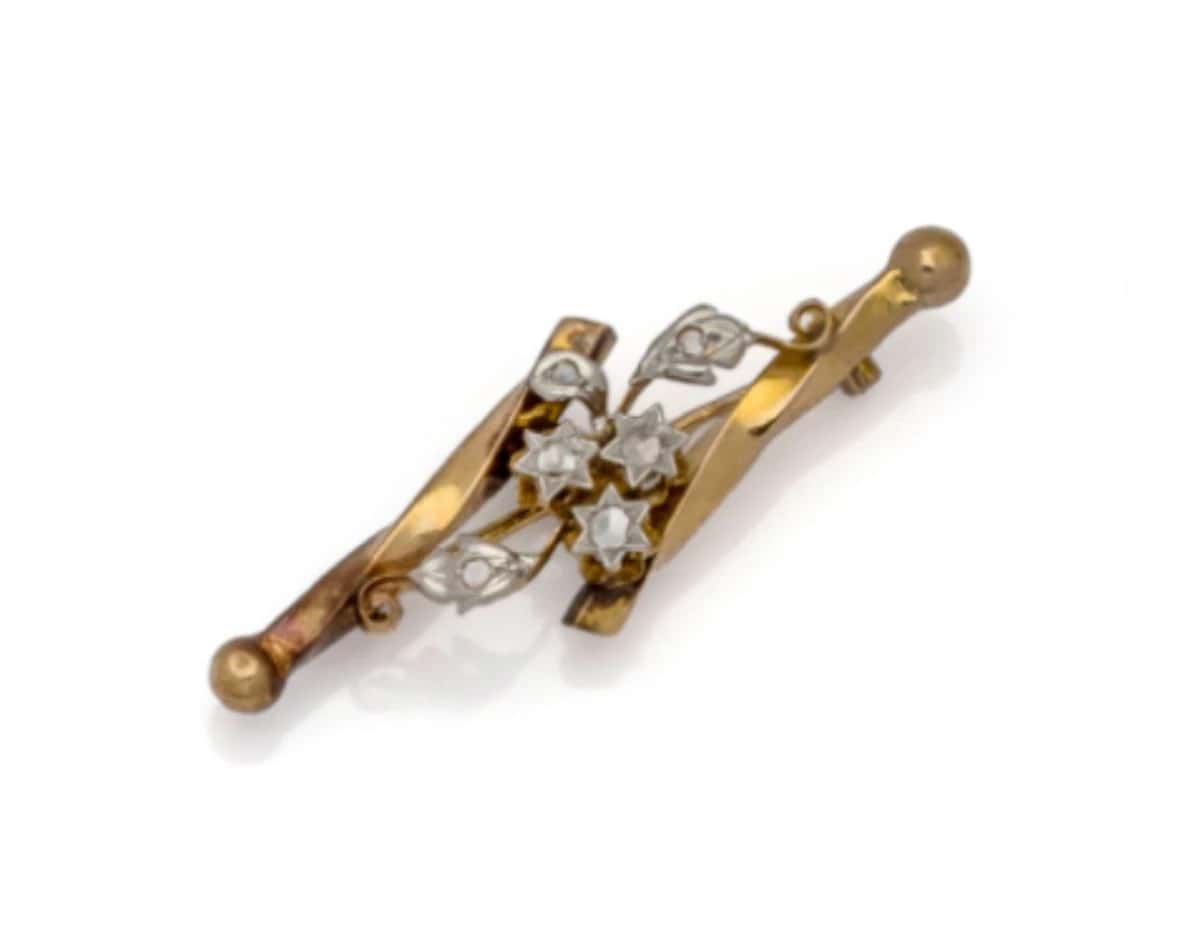 Broche en or jaune 18K (750/1000) et platine (850/…