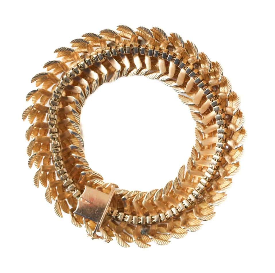 Important bracelet en or jaune et or gris, de 66,10 g